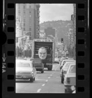 Truck carrying bust of Bob Hope driving down Hollywood Blvd., Hollywood (Los Angeles) 1972