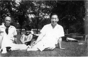 Hahn Chang-Ho, another man, and boy in park