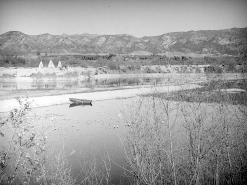 Tepees and a boat on Pop's Willow Lake