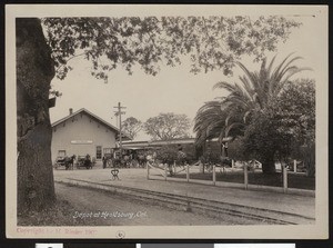 Horse-drawn carriages outside a train depot in Healdsburg, ca.1900
