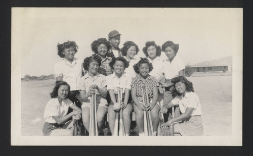 Girls baseball team and manager at Poston II incarceration camp
