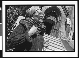 Elderly woman of Filipino origin in front of Saint Patrick's Catholic Church, San Francisco, California, 2002