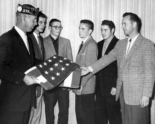 American Legion presents flag