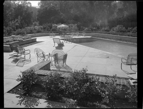 [Unidentified residence]. Outdoor living space and Swimming pool