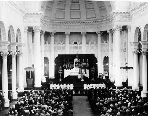 [Interior of St. Ignatius Church during celebration by Father Edward J. Whelan]