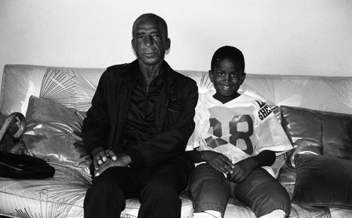 Thomas Nelson Flanagan siting with his son Thomas Flanagan, Jr., Los Angeles, 1985