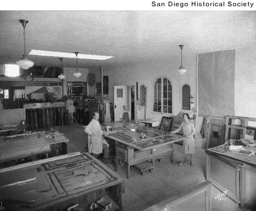 A man and woman working in the Wieland Studios at 3116 El Cajon Boulevard
