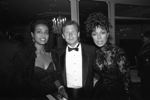 Diahann Carroll and Suzanne Kay posing together at the Black Emmy nominees dinner, Los Angeles, 1989