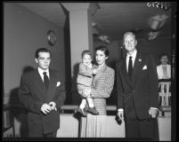 Actor David Brian, Bonita Fielder Davis, her child Michael and Robert Sherman in court for paternity suit, Los Angeles, Calif., 1951