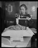 Mrs. Ernest Bennett examines Dale Messman (5 weeks), Los Angeles, 1936