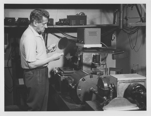 Robert Richardson measuring a plate on an old microphotometer
