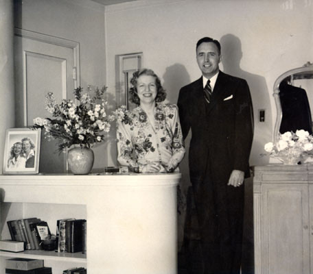 [John and Ruth Bernet posing for a picture in their house at 2123 Jackson Street]