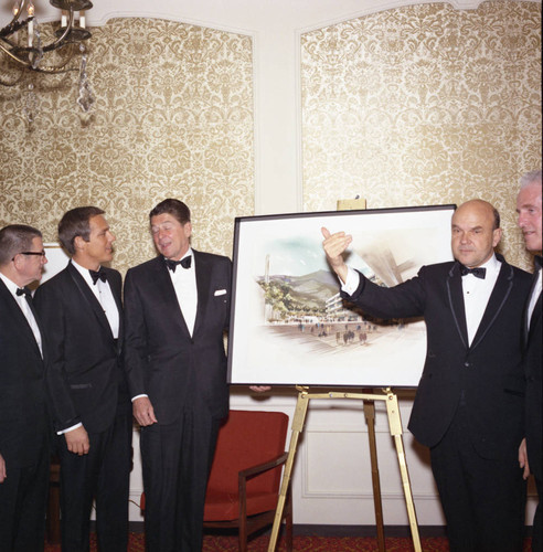 Ronald Reagan and others with Malibu campus rendering at Pepperdine's Birth of a College dinner, 1970