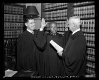 Thomas L. Griffith Jr. being sworn in by judges Victor Hansen and Eugene Fay, Los Angeles, Calif., 1953