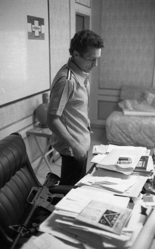 Roberto D'Aubuisson presides over his desk, San Salvador, 1982