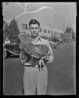 Charles Comerford with his competing rooster, Pomona, 1936