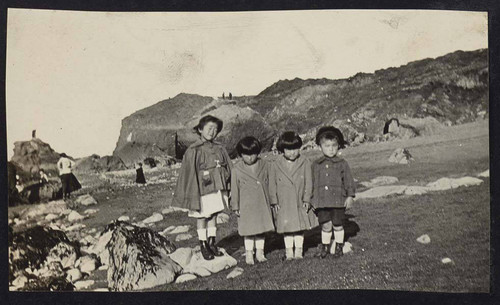 Children posing outside