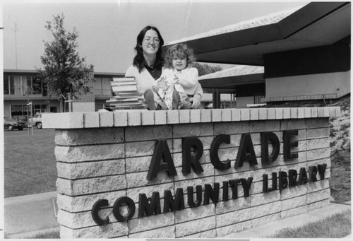 Woman and Child at Arcade Library