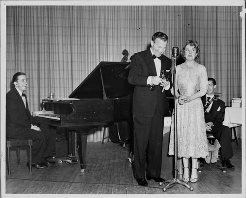 Performing at Woodbury College's 1951 Huckster's Ball are George Burns and Gracie Allen