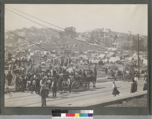 [Large refugee encampment. Crowd gathered for relief distribution, foreground. Market St. near Buchannan.]
