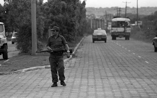 Soldier in the middle of a road, Managua, 1979