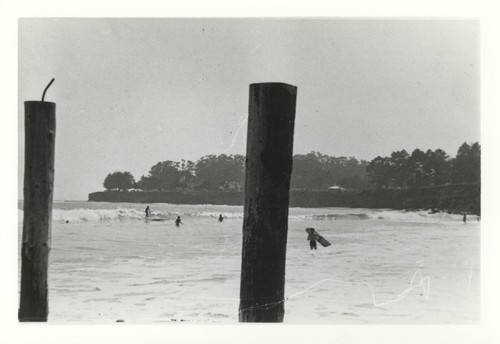 Harry Murray and unidentified surfers at Cowell Beach
