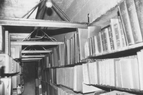 Books shelved in the closed stacks
