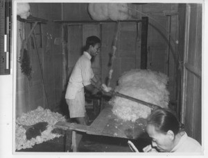 A quilt maker at Wuzhou, China, 1946