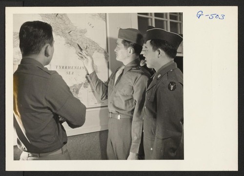 Sgt. Isamu Sanemitsu points out to Lt. Shigeru Tsubota and Pvt. Noboru Hashiro where he was serving in Italy. All