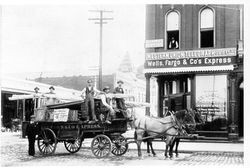 Lee Brothers and Company dray wagon in front of the office on Hinton Avenue