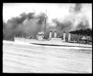View of the USS Melvin in front of a smokescreen