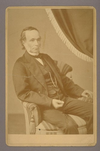 [Portrait of Henry Durant sitting in a chair.]