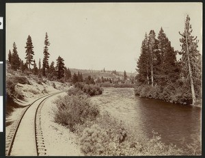 Railway tracks and a river in the Siskiyou mountains in Siskiyou County, California