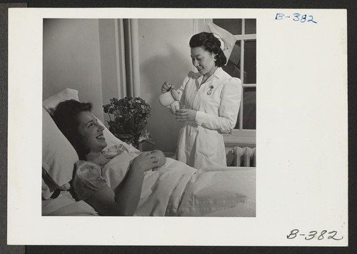 Miss Matilde Honda, attending a patient in the Colorado General Hospital, where she is employed as a staff nurse. Miss