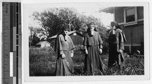 Three Maryknoll Sisters wearing gas masks, Heeia, Hawaii, 1941