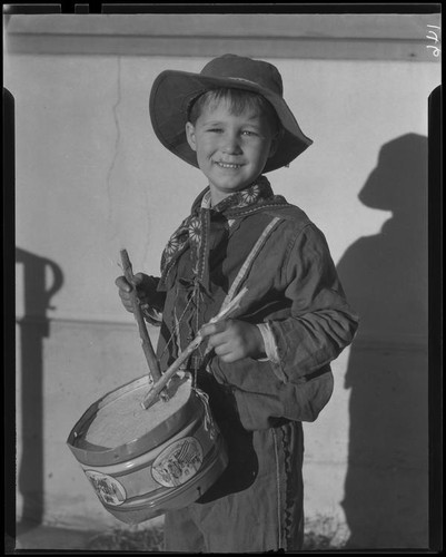 Boy with toy drum, Los Angeles, circa 1935