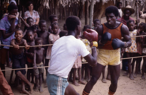 Boxers fighting inside boxing ring, San Basilio de Palenque, 1976