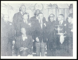 Charles Harrison Mason with a group of unidentified people
