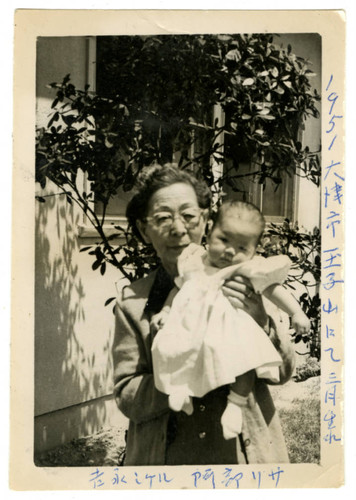 Shigeru Yoshinaga holding Lisa Jo Furutani