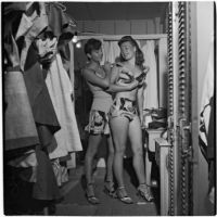 Swim suit models in their dressing room before a fashion show featuring local designers, Los Angeles, September 1946