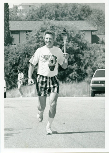 Jules Hershfeld runs with torch, 1991