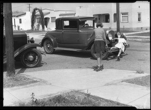 Enacting street hazards-Wilshire & McCadden Place, 1931