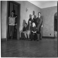 Louis M. Rich and family sit in their empty home after being evicted on Thanksgiving Day, Los Angeles, November 22, 1945
