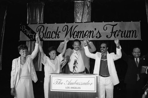 Maxine Waters, Jessie Jackson, and Stevie Wonder at a Black Women's Forum event, Los Angeles, 1984