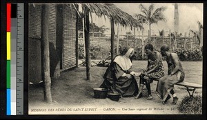 Missionary sister tending to the sick, Gabon, ca.1920-1940