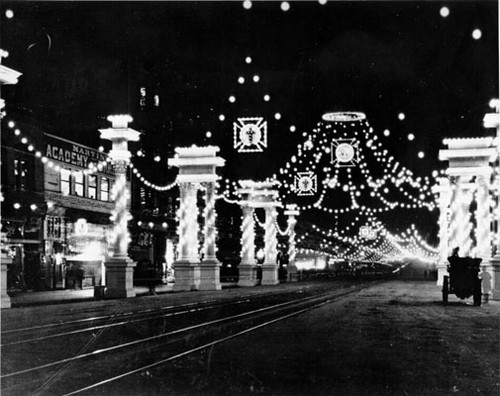 [Knights Templar nighttime decorations at Market, Kearny, Geary and Third streets]