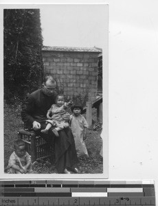 Fr. Hyde with orphans at China, 1941