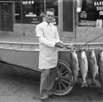Barber with Fish