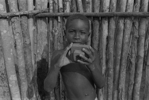 Boy holding a toy camera, San Basilio de Palenque, 1977