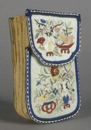 White purse with flowers